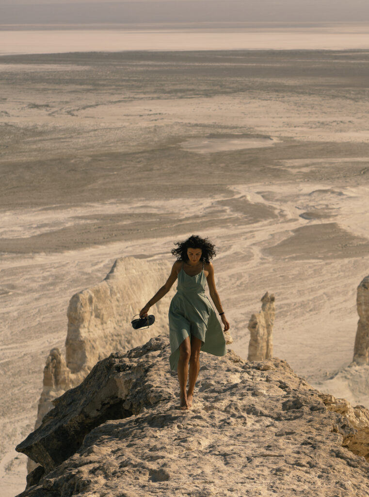 girl in a dress in a lunar landscape 