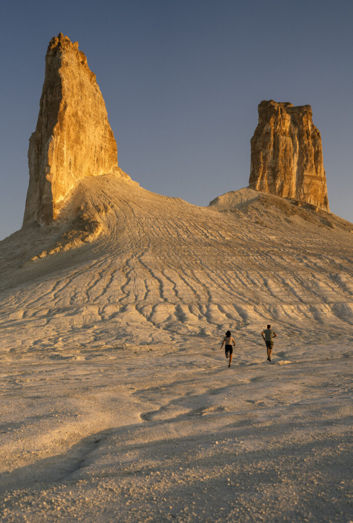 a couple running at sunrise towards bozzhyra fangs 