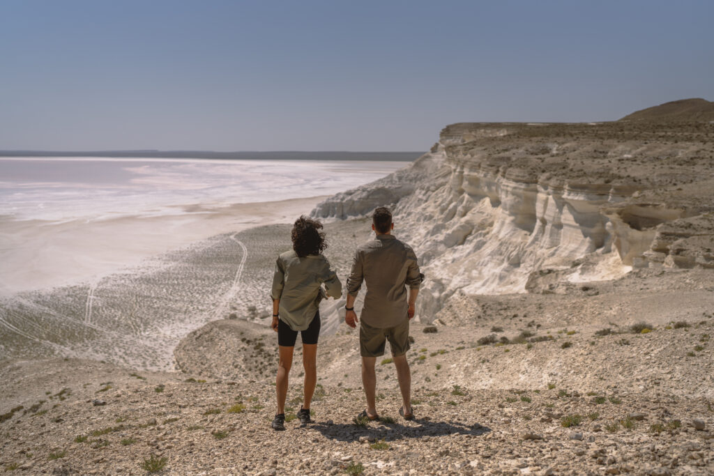 couple watching a salt lake  